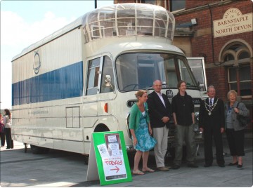 Local dignitaties Nick Harvey and Roy Lucas help launch the Movie Bus project.